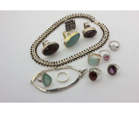 A silver necklace, a Mexican silver bracelet, ten various silver and gem set rings, and a gilt ring