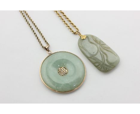 A Chinese gold mounted jade pendant on a 9ct gold ropework neck chain, and a carved jade pendant on 9ct gold neck chain, 18.9
