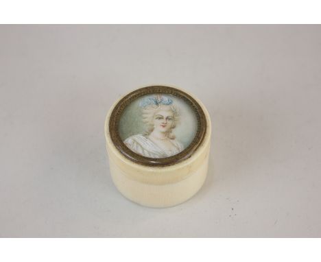 A 19th century ivory patch box, the lid with painted miniature of a woman in white dress and pearl necklace, 4cm diameter 