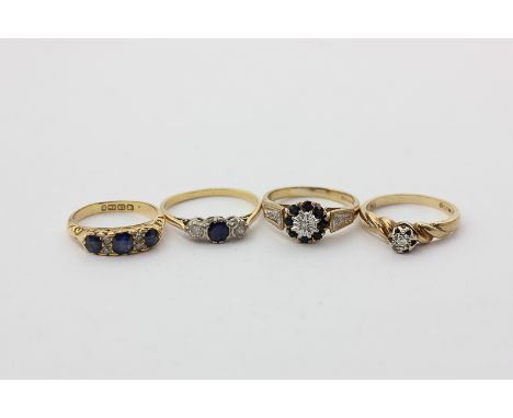A sapphire and diamond three-stone ring, a sapphire and diamond cluster ring, an illusion set diamond ring, and a sapphire an