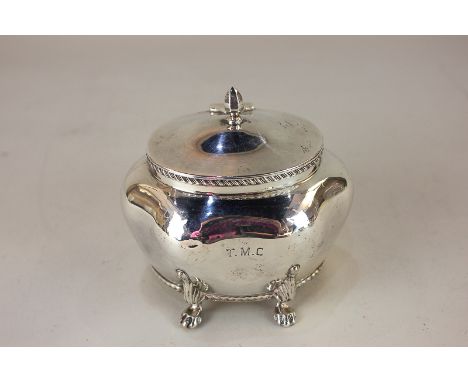 An Edward VII silver tea caddy of scalloped ovoid form on paw feet, marks worn, Birmingham 1905, 5.5oz