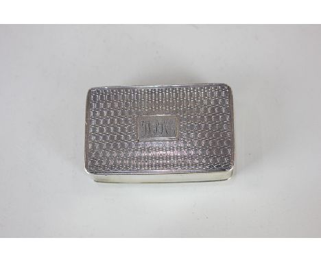A William IV silver snuff box, rectangular engine turned top with engraved initials to centre, gilt interior, maker WT, Londo