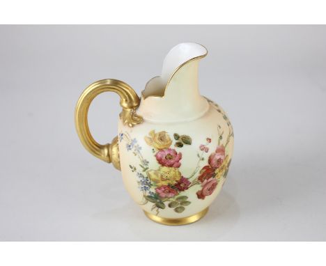 A Royal Worcester porcelain jug depicting a floral spray on ivory blush ground