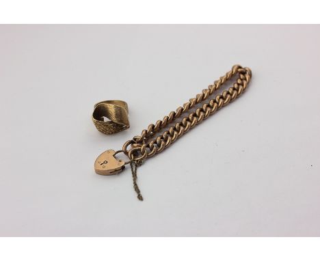 A 9ct gold curb link bracelet with padlock clasp, and a 9ct gold ring, 21g