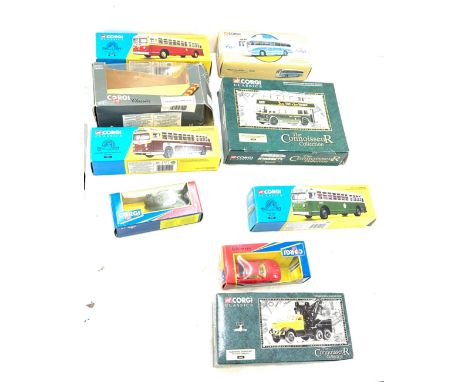 Nine boxed Corgi buses and cars 