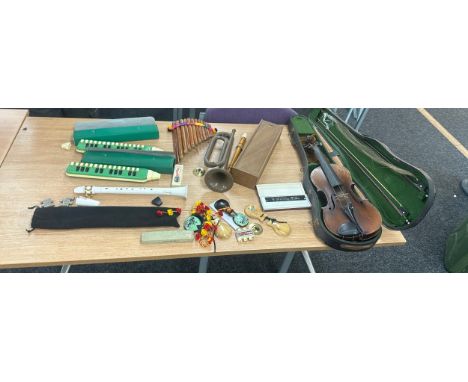 Selection of musical instrument, violin, bugle, melodica x2, recorder, tenor recorder, castantents, pan pipes and tuners