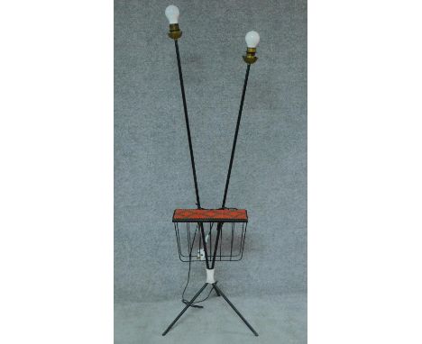 A vintage 1960's twin light metal lamp standard with ceramic table top and magazine rack to tripod base. H.153cm 