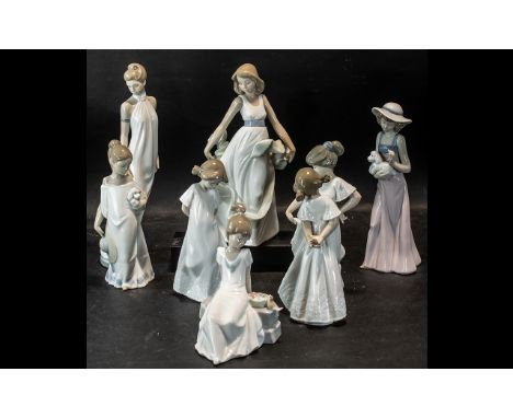 Collection of Nao by Lladro Figurines, comprising 'Elegance' No. 57502 12" tall, Muse No. 5651, Seated Girl with Bird No.5650