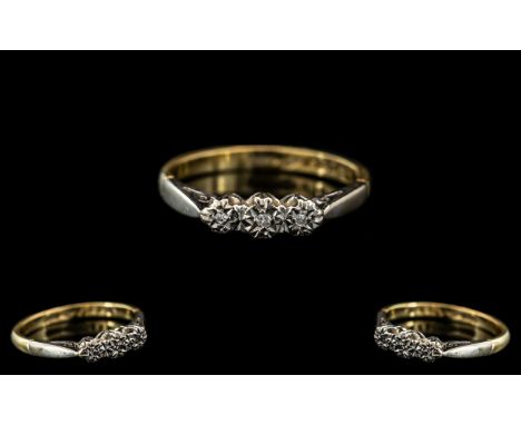 18ct Gold Ring, set with three illusion set diamond chips, ring size J/K.  Weight 2.3 grams.