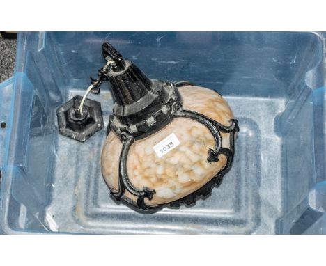 Antique Light Fitting, circa 1920, vestibule light with mottled white and peach glass and metal scrolled trim, with chain sus
