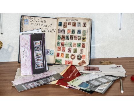 Stamp Interest - Stamp Album containing GB stamps, and worldwide including Aden, Antigua, Australia, Ascension, Bahamas, Barb