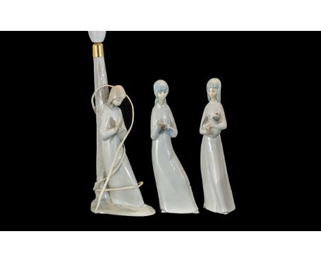Valencia Porcelain Lamp Base, Lladro Style, depicting a young lady in prayer, measures 40 cm overall, together with two match