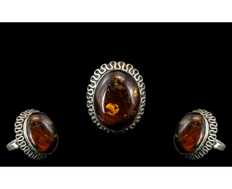 Mid Century Amber Ring Set In Silver. Large Amber Stone Set In Celtic Design. Cabochon Amber Stone of Large Size. Nice Statem