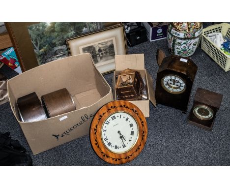 A Box Containing a Collection of Seven Clocks to include two 1920s mantle clocks, a Russian wall clock, battery operated mant