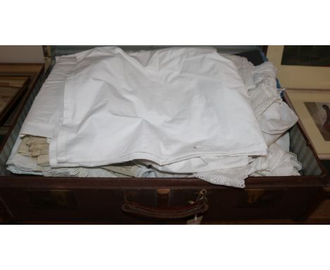 A quantity of lace and linen, children's embroidered boleros, gowns and blouses, etc contained in a bentwood and canvas steam