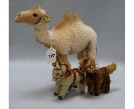 A Steiff camel, a Steiff 1960's miniature pony and an Irish Setter, all with button in ear