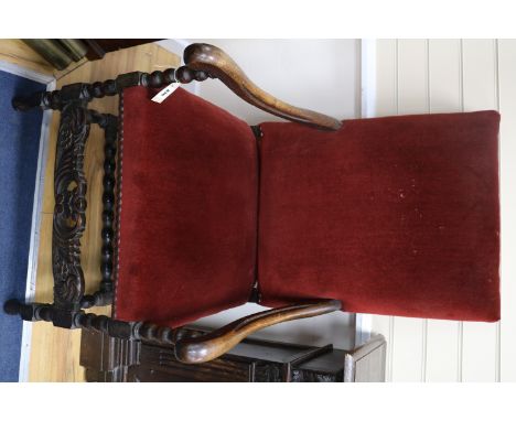 An Edwardian bobbin turned barley twist oak armchair