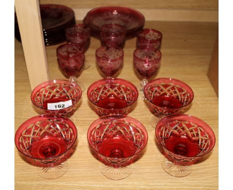 A set of six ruby overlaid vineous cut glasses, six dessert dishes and a group of assorted plates