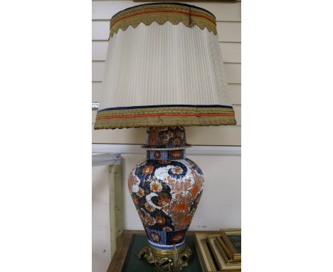 A large brass mounted Imari vase table lamp, overall height incl. shade 35in.