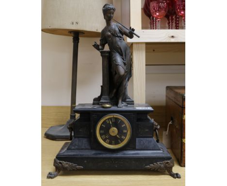 A Victorian black marble and bronzed spelter mantel clock, 21in.