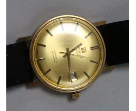 A gentleman's gold Tissot Seastar automatic wrist watch.