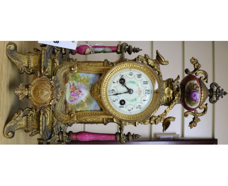 A late 19th century French ormolu and porcelain mantel clock, 17in.