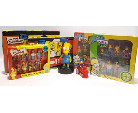 Quantity of The Simpsons Collectibles Includes Greetings from Springfield Collectors Tins, Boxed Figures, Chess Set, Lost &am