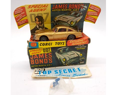 Corgi 261 "James Bond" Aston Martin DB5 (Machine Guns Not Working &amp; Missing Lapel Badge) Good to Good Plus within Good Pa