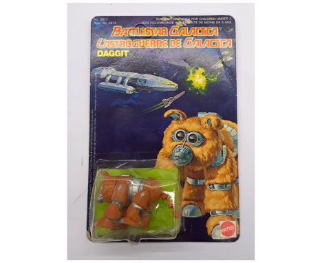 Mattel Star Battlestar Galactica Daggit 3 3/4" vintage figure Near Mint within Good Plus Packaging.
