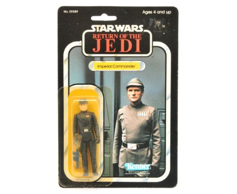 Kenner Star Wars vintage Return of the Jedi Imperial Commander 3 3/4" figure, Mint, within Good Plus (yellowed) bubble, upon 