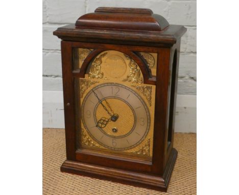 A Georgian style reproduction bracket clock with fusee movement, brass and silver arched dial, stamped John Yeandle of Bright