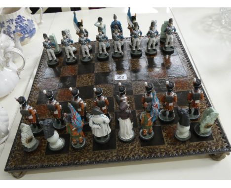 A Napoleonic chess set with board 