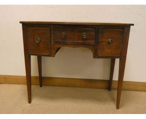 A Georgian style bow front mahogany sideboard fitted drawer and cupboards on square taper legs 3'6 wide 