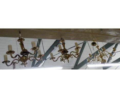 A pair of five branch brass electric light pendants and another similar  