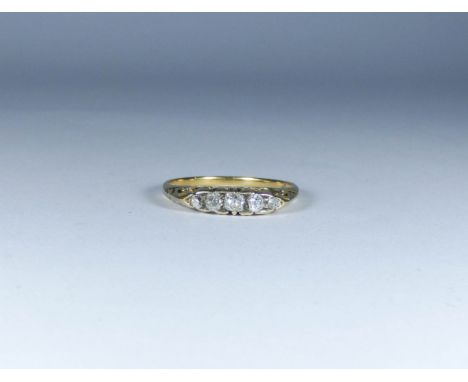 Victorian five stone diamond ring in carved setting unmarked tests as 18ct, ring size R 