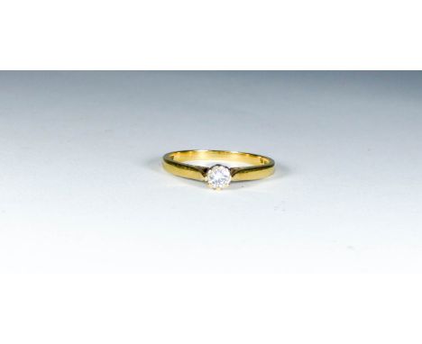 An 18ct yellow gold single stone diamond ring, ring size M