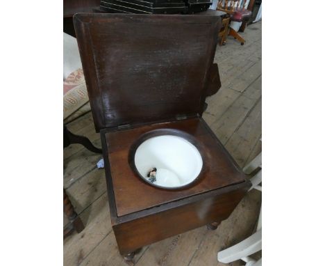 A Victorian mahogany box commode with liner with later green leather top 