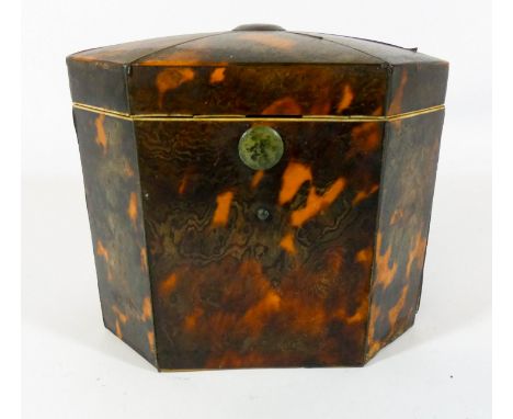 A Regency tortoiseshell tea caddy of octagonal form, 11cms across 