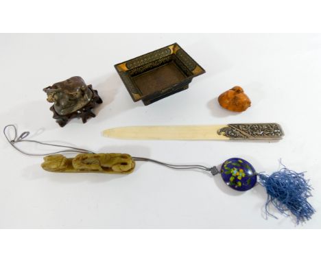 A collection of antique oriental items to include letter opener, cloisonne pendant, treen Netsuke etc