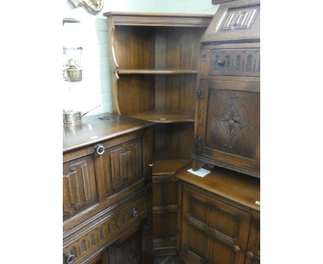 An Ercol Golden Dawn open court cabinet with cupboard under 