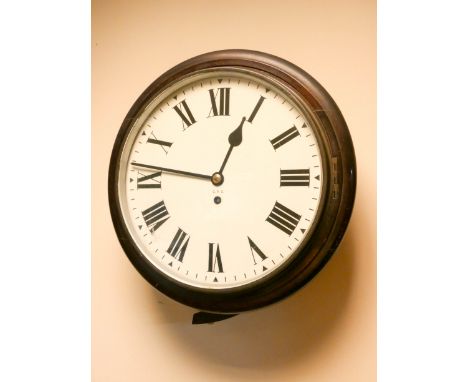 A Victorian circular GPO wall clock with fusee movement and white enamel dial with Roman numerals 14 1/2" diameter overall   