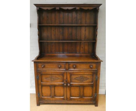 A good quality reproduction oak Welsh style dresser with shelf back drawers and cupboards under, 4' wide 