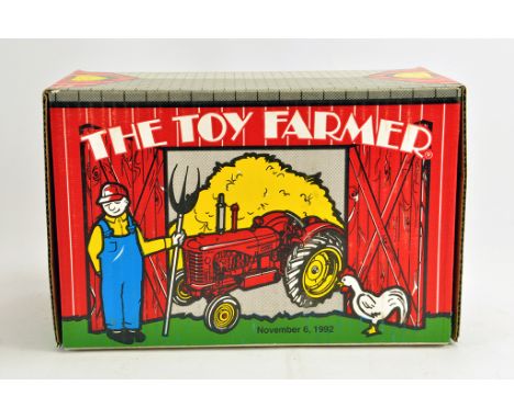 Ertl 1/16 Toy Farmer Massey Harris Tractor. M in Box.