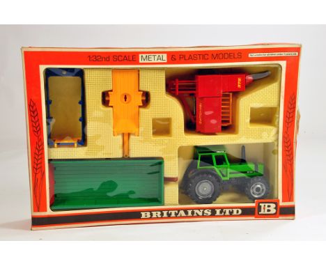Britains No. 9589 Farm Gift Set comprising of Deutz Tractor DX110 Tractor plus various implements. Fine example is M in a VG 