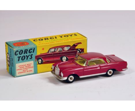 Corgi No. 230 Mercedes 220SE Coupe. Dark Red. NM in VG to E Box.