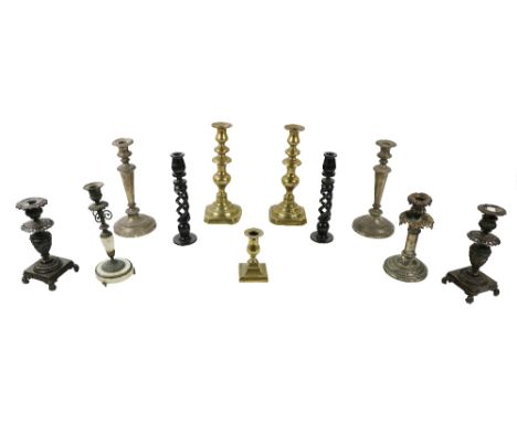 A pair of heavy brass turned pillar Candlesticks, each approx. 30cms (12") high; a pair of ornate and decorated Candlesticks 