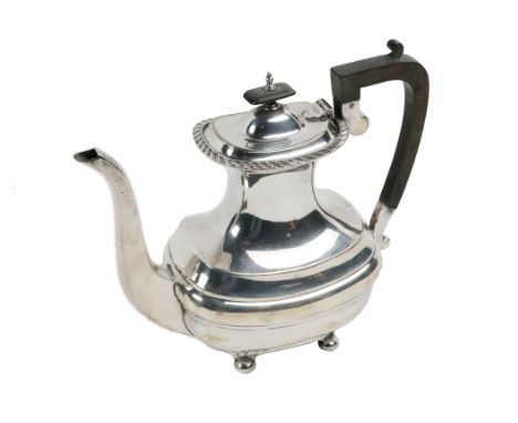 A Sheffield silver Coffee Pot, in the c. 1810 style, the oblong plain body with a pressed central rib with deep incurved neck