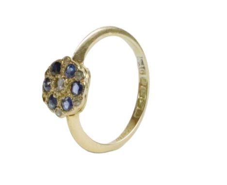 An 18ct gold Ladies cluster Ring,&nbsp;set with six 2.5mm round (.48ct) sapphires and six rosecut chips, size K, hallmarked. 