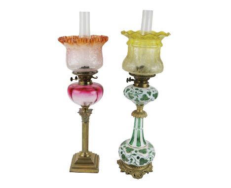 An attractive tall Victorian green decorated milk glass Table Lamp, with gilt metal base, shamrock design body and matching b