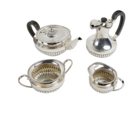 A Sheffield silver four piece Tea Service, consisting of a Teapot, Hot Water Jug, Sugar Bowl and Cream Jug, in the Georgian s